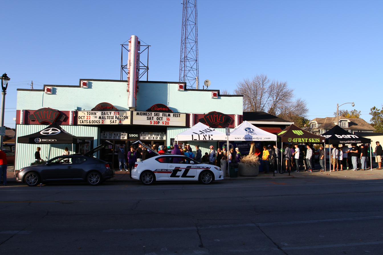 Times Cinema marquee, sponsor village, and the Scion display vehicle on Vliet Street, October 2010